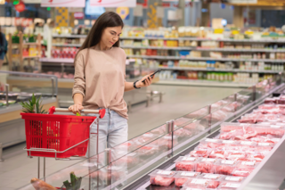 Shopper viewing food safety label